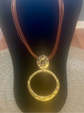 Gold Circular Pendant Necklace with Brown Cord